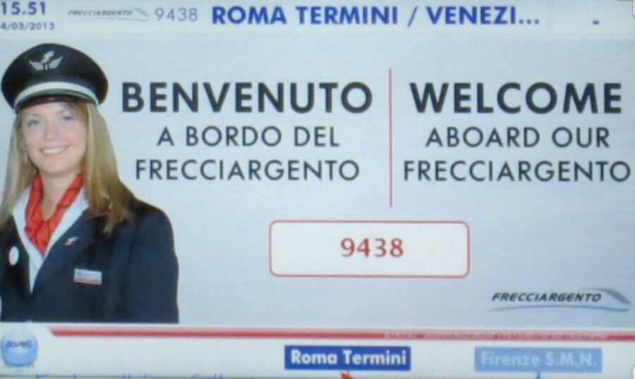 Welcome sign on an Italian train from Rome to Venice.